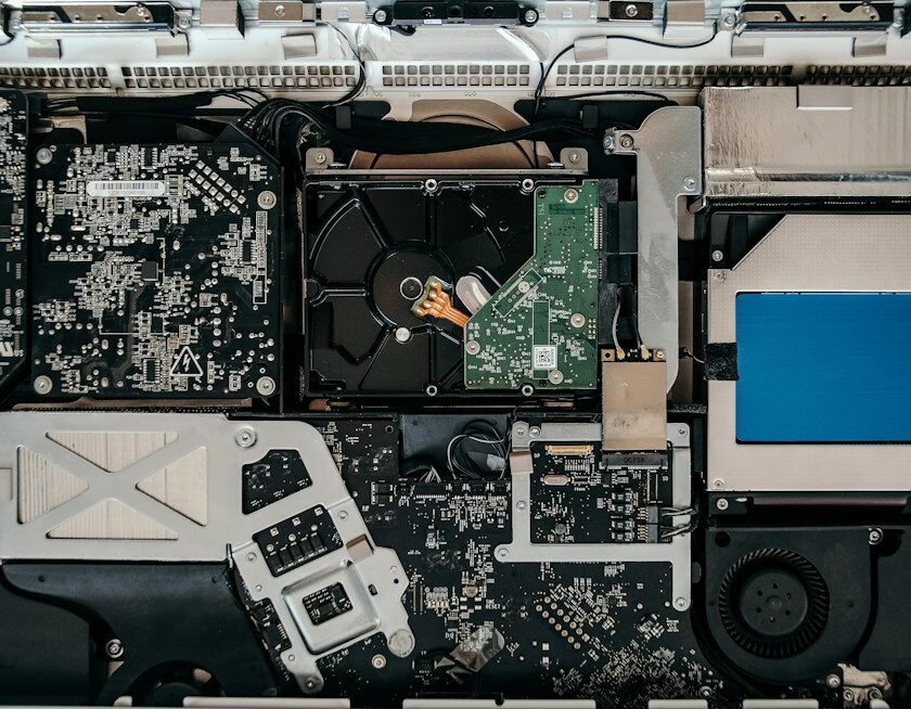 Cover image for laptop motherboard repair workflow with ESD strap, bench PSU, and multimeter